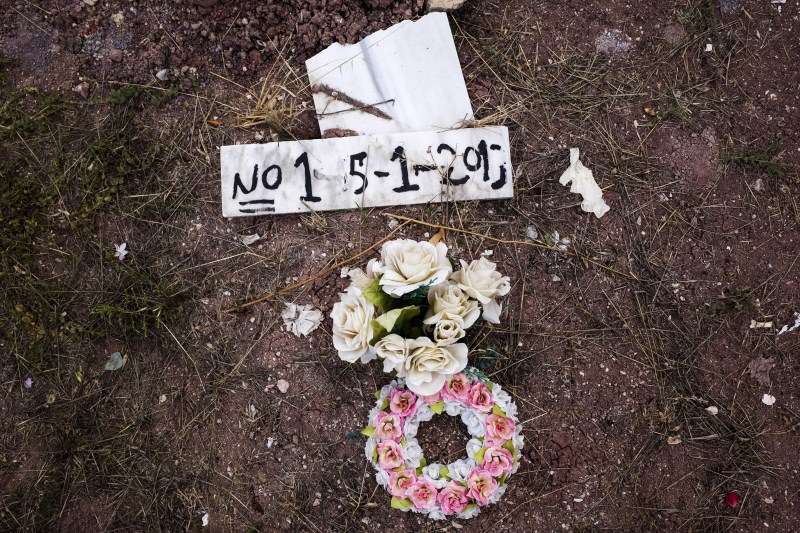 Drowned migrants are laid to rest in the pauper's section of a cemetery on the Greek island of Lesbos. Greece's Lesbos for refugees lost at sea,refugees lost at sea,Greece Lesbos,Drowned migrants,migrants,Greek island