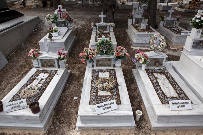 Drowned migrants are laid to rest in the pauper's section of a cemetery on the Greek island of Lesbos. Greece's Lesbos for refugees lost at sea,refugees lost at sea,Greece Lesbos,Drowned migrants,migrants,Greek island