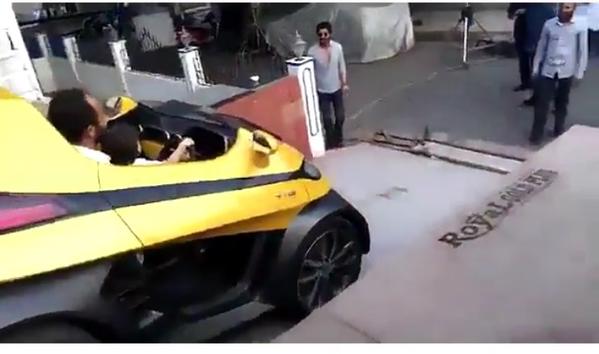 Shahrukh Khan's son Abram driving car with Rohit shetty on the sets of Dilwale. Shahrukh Khan,SRK's son Abram,SRK son Abram,Abram Khan,Dilwale,SRK,Rohit Shetty