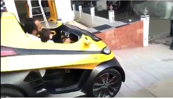 Shahrukh Khan's son Abram driving car with Rohit shetty on the sets of Dilwale. Shahrukh Khan,SRK's son Abram,SRK son Abram,Abram Khan,Dilwale,SRK,Rohit Shetty