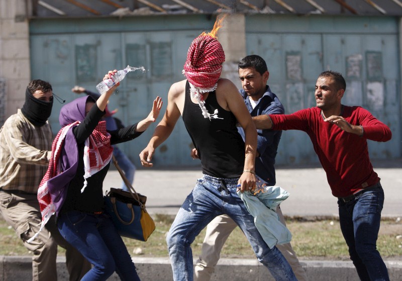 Seven Israelis and 27 Palestinians, including nine alleged attackers and eight children, have died in almost two weeks of street attacks and security crackdowns. The violence has been stirred in part by Muslim anger over increasing Jewish visits to the al-Aqsa mosque compound in Jerusalem, Islam's holiest site outside the Arabian Peninsula. Palestinian-Israeli tensions,Israelis,Palestinians,Muslim anger,al-Aqsa mosque,Jewish,Arabian Peninsula