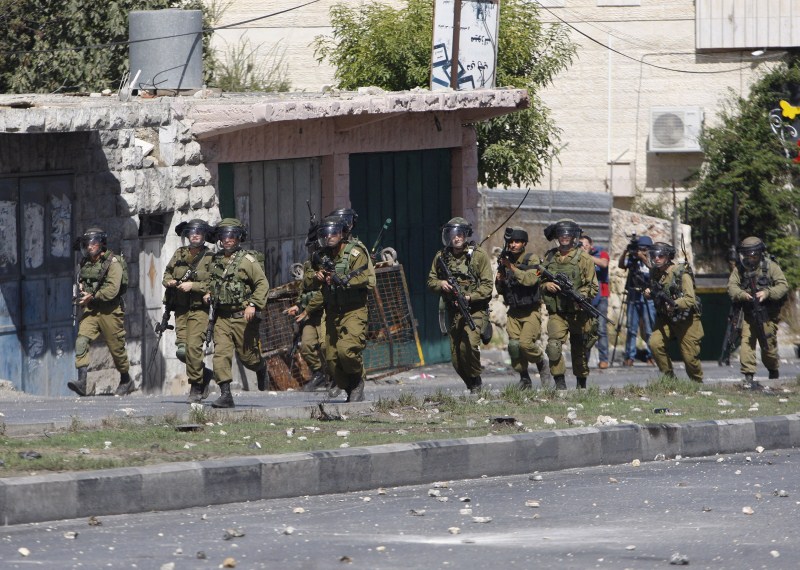 Seven Israelis and 27 Palestinians, including nine alleged attackers and eight children, have died in almost two weeks of street attacks and security crackdowns. The violence has been stirred in part by Muslim anger over increasing Jewish visits to the al-Aqsa mosque compound in Jerusalem, Islam's holiest site outside the Arabian Peninsula. Palestinian-Israeli tensions,Israelis,Palestinians,Muslim anger,al-Aqsa mosque,Jewish,Arabian Peninsula