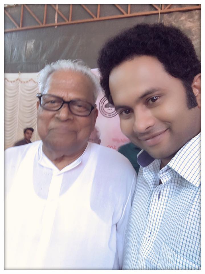 Malayalam actor Aju Varghese is seen taking selfie with Kerala opposition leader VS Achuthanandan at Barton Hill college, Thiruvananthapuram. Aju Varghese,Aju Varghese photos,Aju Varghese selfie with VS,VS Achuthanandan,VS in Barton Hill,Aju varghese in Barton Hill