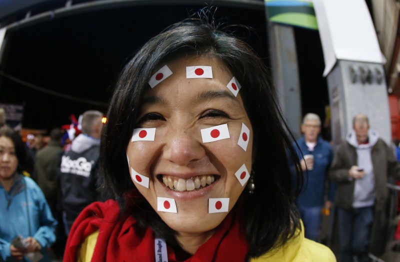 Fans posses during the IRB Rugby World Cup 2015 in Kingsholm. Rugby World Cup,Rugby World Cup 2015,IRB Rugby World Cup 2015,IRB Rugby World Cup,Fans posses,face paint