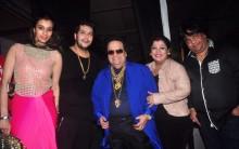 Music composer Bappi Lahiri performs with celebs at the North Bombay Sarbojanin Durga Puja.