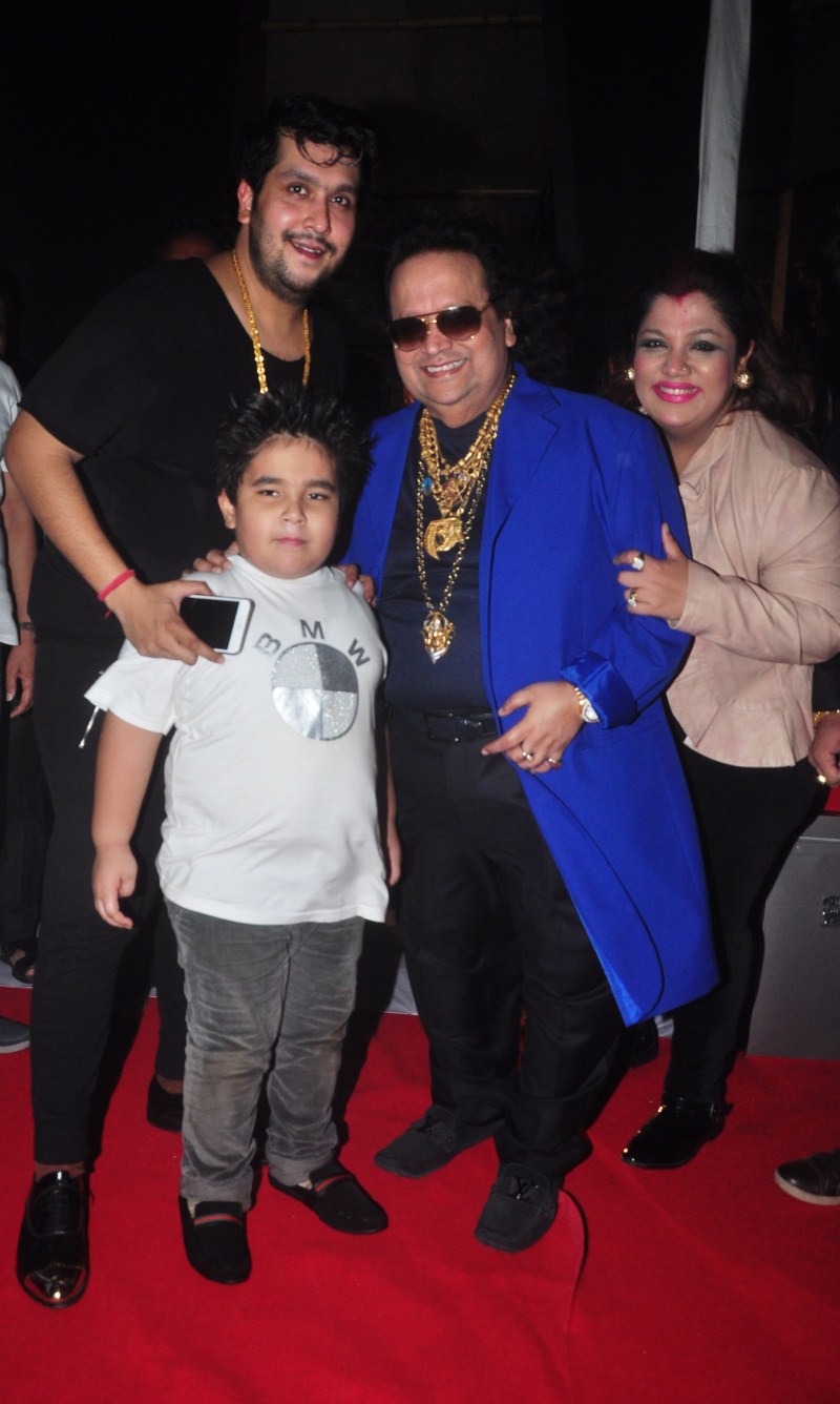 Music composer Bappi Lahiri performs with celebs at the North Bombay Sarbojanin Durga Puja. Bappi Lahiri,music composer Bappi Lahiri,Durga Puja,Durga Puja celebration,Durga Puja 2015