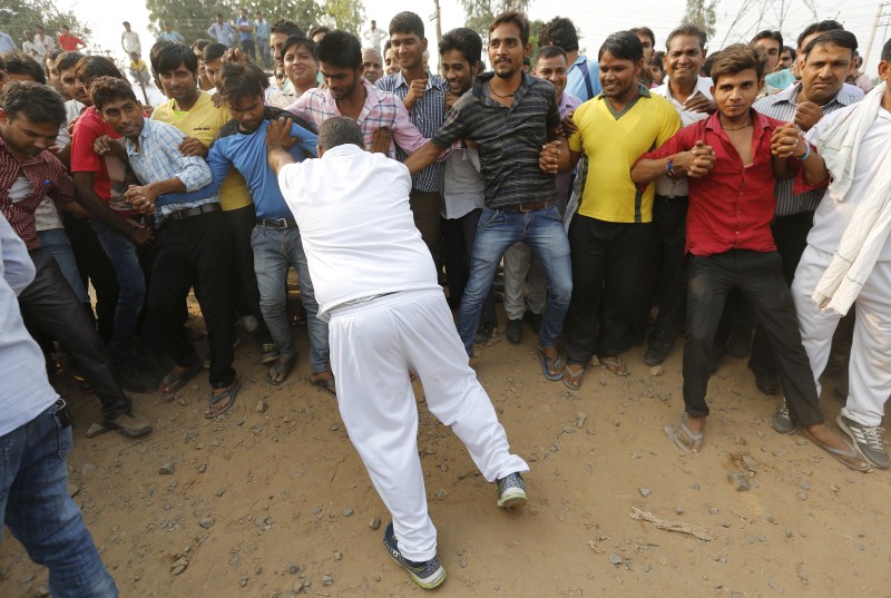 Police in India have arrested four men over allegations they burnt alive two low-caste children, feeding concerns of rising intolerance. Children burned alive,low caste children,low caste children burned alive,India