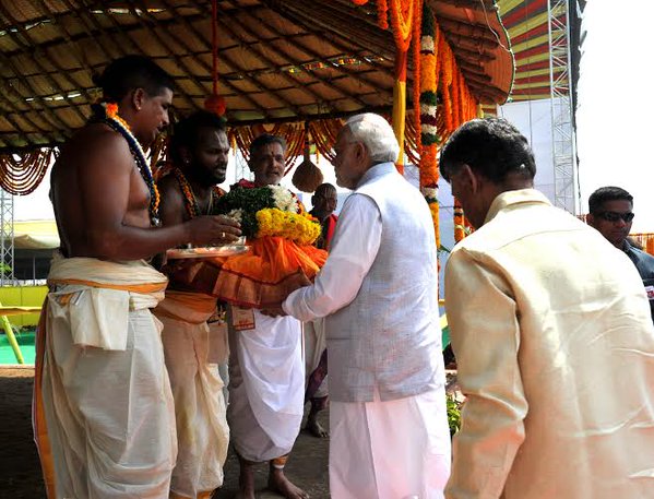 Prime Minister Narendra Modi laid the foundation stone of Andhra Pradesh's new capital Amaravati in Guntur district at a grand event today. Narendra Modi,Andhra Pradesh,Andhra Pradesh new capital Amaravati,Amaravati,Andhra Pradesh capital Amaravati,Guntur,Chandrababu Naidu