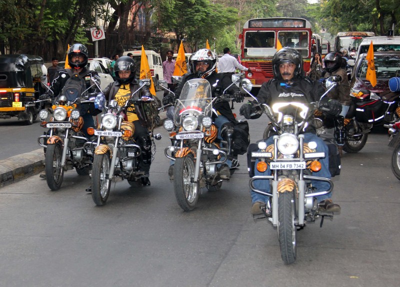 Bollywood megastar Amitabh Bachchan and Maharashtra, Finance minister Sudhir Mungantiwar today flagged off a bike rally, covering four out of the six tiger reserves in the state, in support of the government's 'Save Tiger' campaign. Amitabh Bachchan,bike rally,Amitabh Bachchan,Sudhir Mungantiwar Flag Off Tiger Conservation Rally,Tiger Conservation Rally,Save Tiger