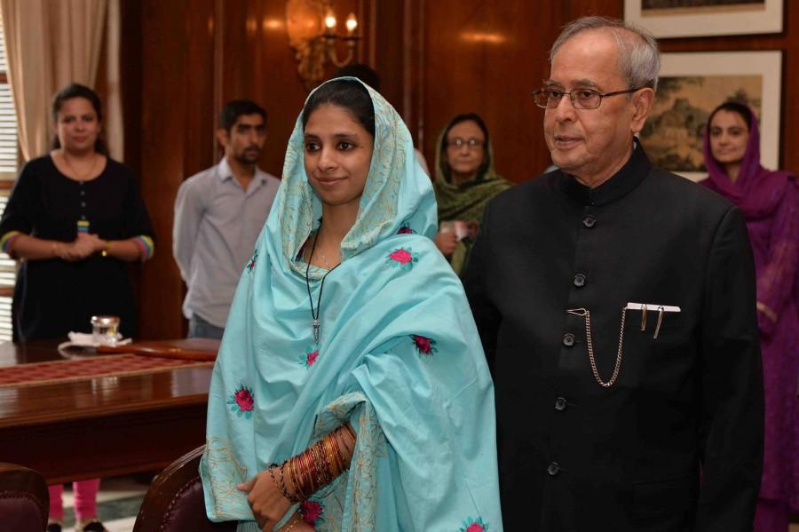 Indian President Pranab Mukherjee met Geeta, the hearing and speech impaired girl at Rashtrapati Bhawan on Tuesday, 27 October Geeta in india,geeta returns to india,geeta pakistan to india,geeta meets indian president,geeta meets pranab mukherjee,geeta meets Indian PM,geeta meets Narendra Modi,geeta meets Arvind Kejriwal