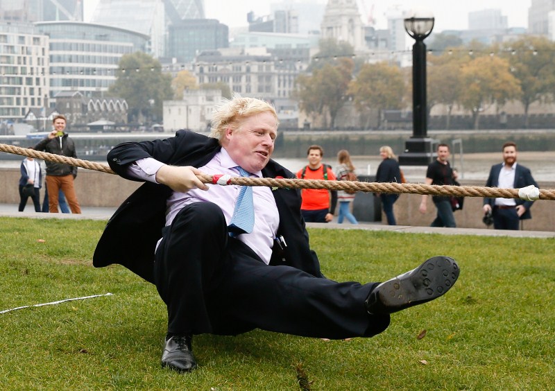 London mayor Boris Johnson has taken a tumble as he competed in a tug of war against members of the armed forces. London Poppy Day,London Poppy Day 2015,Boris Johnson,London mayor Boris Johnson,tug of war