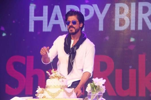Bollywood King Khan cuts his birthday cake on his 50th birthday celebration in Mumbai.