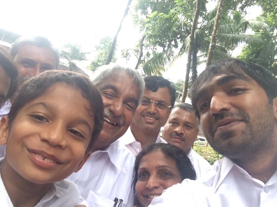 The two-phase Kerala local body elections began on 2 November Kerala elections,Oommen Chandy voting selfie,meera nandan,celebrities after voting,voting selfies