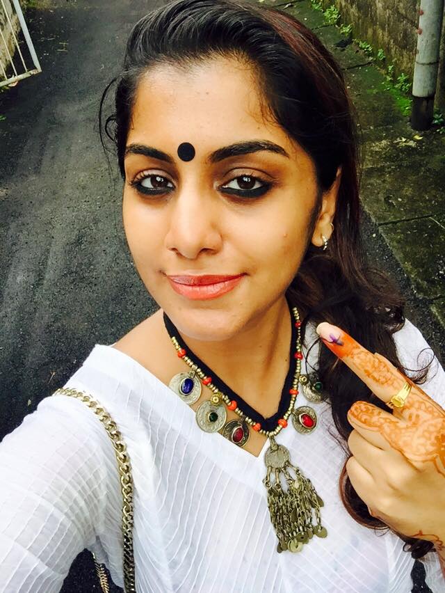 The two-phase Kerala local body elections began on 2 November Kerala elections,Oommen Chandy voting selfie,meera nandan,celebrities after voting,voting selfies