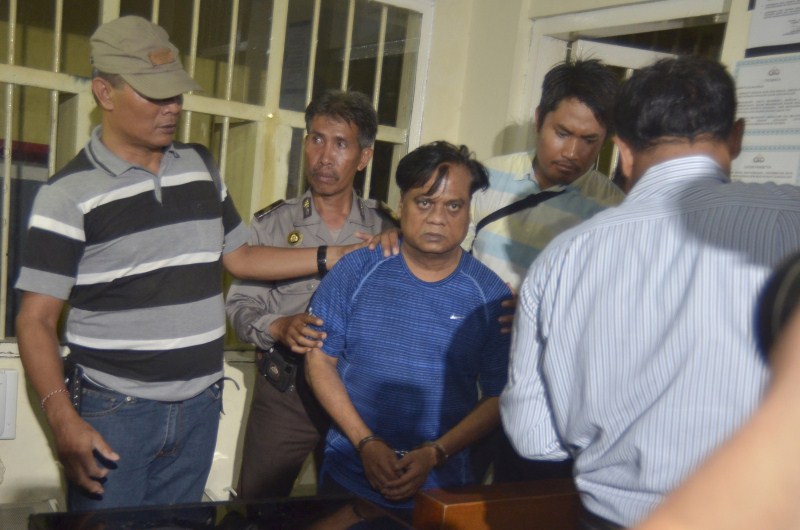 Indian security personnel stand guard at the gate of the airport before the believed arrival of India's most-wanted man, Rajendra Nikalje, widely known as Chhota Rajan, in New Delhi Chhota Rajan,Chhota Rajan back in India,Chhota Rajan returns,Rajendra Nikalje