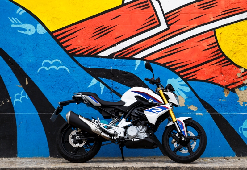 The first offspring from the BMW Motorrad-TVS Motor Company, the G 310 R naked street bike, has been unveiled. BMW-TVS,TVS BMW G 310 R,TVS BMW Motor cycle,TVS-BMW G 310 R pictures,BMW G 310 R details,BMW TVS 300cc bike,New BMW bike,bmw tvs upcoming bikes,tvs bmw bike price in india,tvs bmw bike news