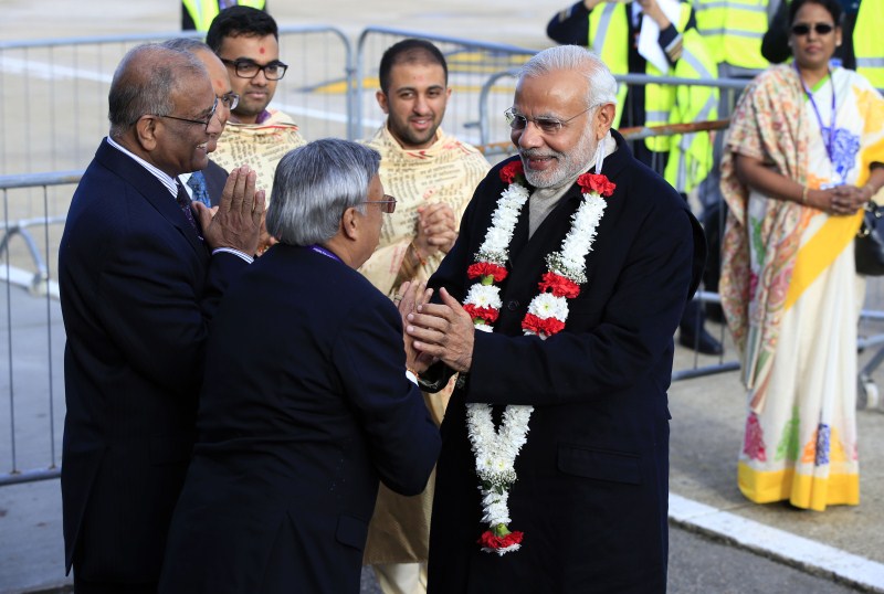 Prime Minister Narendra Modi arrived in London on Thursday (12 November) for his first visit to the United Kingdom since he assumed office. Narendra Modi,Narendra Modi UK Visit,Narendra Modi UK Visit Day 1,Narendra Modi in UK,Narendra Modi addesses,David Cameron,modi and David Cameron,Narendra Modi and David Cameron