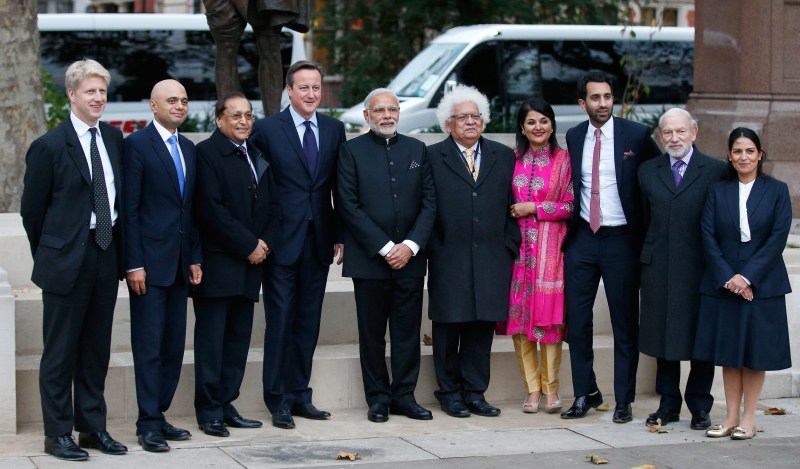 Prime Minister Narendra Modi arrived in London on Thursday (12 November) for his first visit to the United Kingdom since he assumed office. Narendra Modi,Narendra Modi UK Visit,Narendra Modi UK Visit Day 1,Narendra Modi in UK,Narendra Modi addesses,David Cameron,modi and David Cameron,Narendra Modi and David Cameron