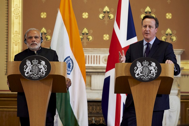 Prime Minister Narendra Modi arrived in London on Thursday (12 November) for his first visit to the United Kingdom since he assumed office. Narendra Modi,Narendra Modi UK Visit,Narendra Modi UK Visit Day 1,Narendra Modi in UK,Narendra Modi addesses,David Cameron,modi and David Cameron,Narendra Modi and David Cameron
