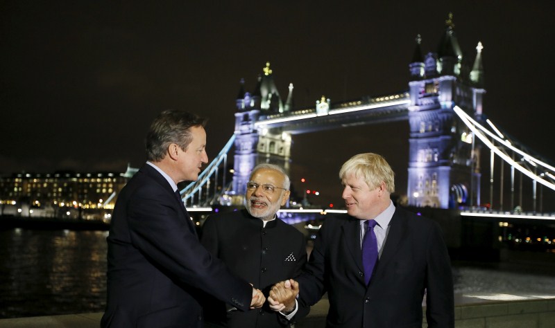 Prime Minister Narendra Modi arrived in London on Thursday (12 November) for his first visit to the United Kingdom since he assumed office. Narendra Modi,Narendra Modi UK Visit,Narendra Modi UK Visit Day 1,Narendra Modi in UK,Narendra Modi addesses,David Cameron,modi and David Cameron,Narendra Modi and David Cameron