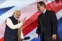 PM Modi accompanied by his British counterpart David Cameron walks towards the stage for his address at Wembley.