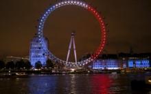 Around the world landmark buildings light up in the colours of the French flag.