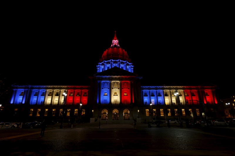 Around the world landmark buildings light up in the colours of the French flag. Paris Attack,World Honours The City of Lights,The City of Lights,buildings light,French flag