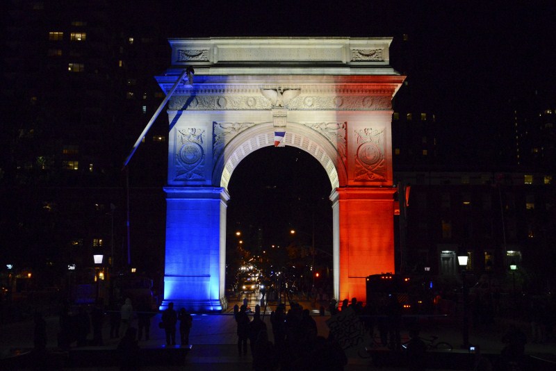 Around the world landmark buildings light up in the colours of the French flag. Paris Attack,World Honours The City of Lights,The City of Lights,buildings light,French flag