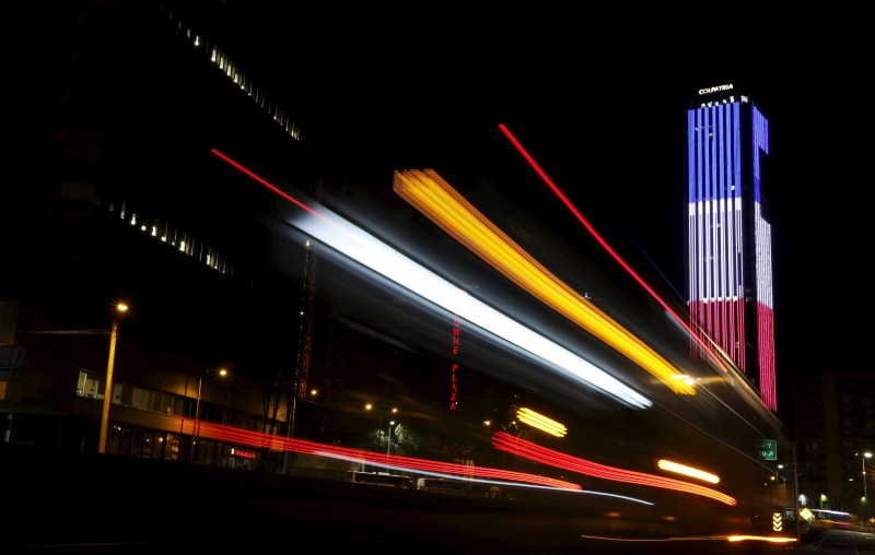 Around the world landmark buildings light up in the colours of the French flag. Paris Attack,World Honours The City of Lights,The City of Lights,buildings light,French flag