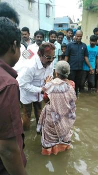 DMDK leader Vijayakanth meets rain affected victims in Chennai.
