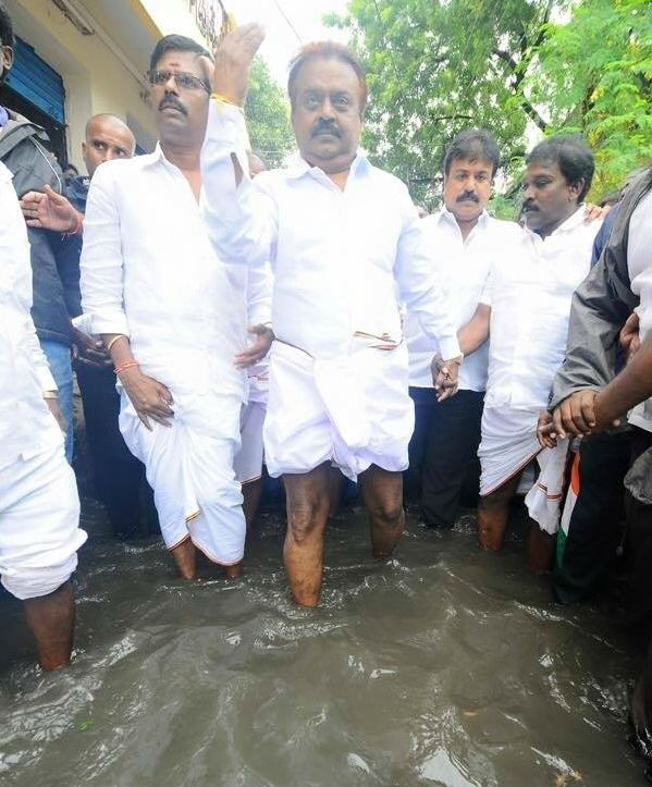 DMDK leader Vijayakanth meets rain affected victims in Chennai. Vijayakanth,Vijayakanth meets rain affected victims in Chennai,DMDK leader Vijayakanth,heavyrain in chennai,Chennai affected victims,Chennai rain