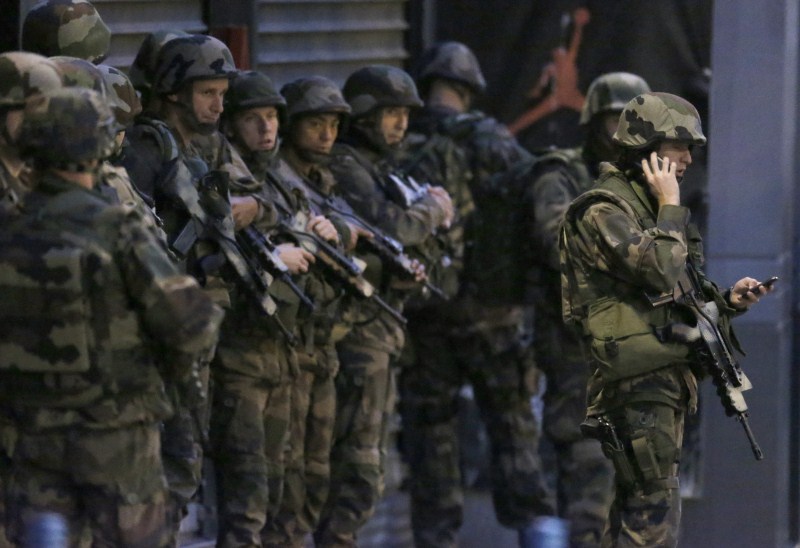 Gunfire erupted in a north Paris suburb early on Wednesday as special police forces launched an operation to catch suspects believed to be behind gun and bomb attacks in which 129 people were killed last week. Paris Attacks,Gunfire erupts in Saint-Denis,Gunfire in Saint-Denis,Gunfire at Saint-Denis,Saint-Denis,bomb attacks,Gunfire erupted,north Paris