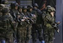 Gunfire erupted in a north Paris suburb early on Wednesday as special police forces launched an operation to catch suspects believed to be behind gun and bomb attacks in which 129 people were killed last week.