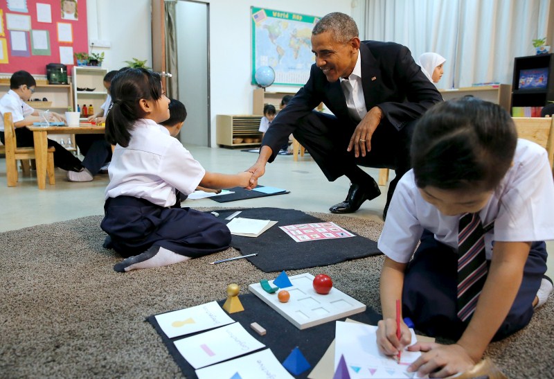 U.S. President Barack Obama meets refugees who will soon be resettled in the U.S Barack Obama,Barack Obama hugs refugee,Barack Obama hugs refugee kids,President Barack Obama,Barack Obama pics,Barack Obama images,Barack Obama photos,Barack Obama stills