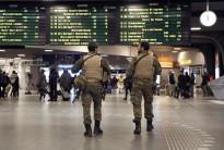 Soldiers patrolled the streets of Brussels on the third day of a security lockdown on Monday and the tenth day of a manhunt for the suspected mastermind of the 13 November attacks in Paris.