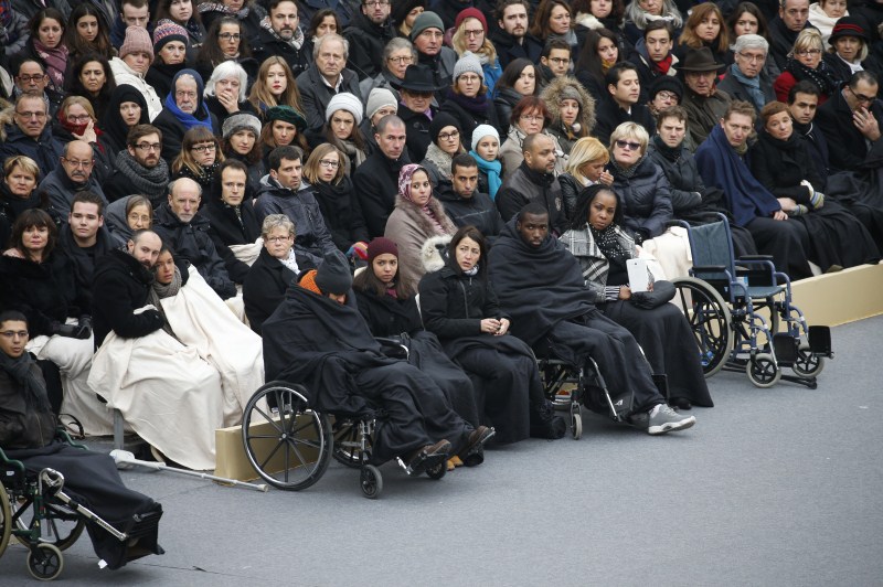 Victim families pay tribute at memorial ceremony at Les Invalides monument in Paris, France on 21 November. Paris Attack,Paris Attack 2015,Victim families pay tribute,memorial ceremony