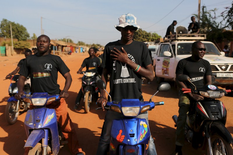 Burkina Faso votes in its first free election in three decades, a year after Blaise Compaore was ousted in a military-backed uprising. Burkina votes,Roch Marc Kabore,Zephirin Diabre,Burkina Faso votes