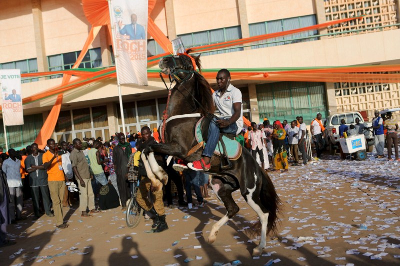 Burkina Faso votes in its first free election in three decades, a year after Blaise Compaore was ousted in a military-backed uprising. Burkina votes,Roch Marc Kabore,Zephirin Diabre,Burkina Faso votes
