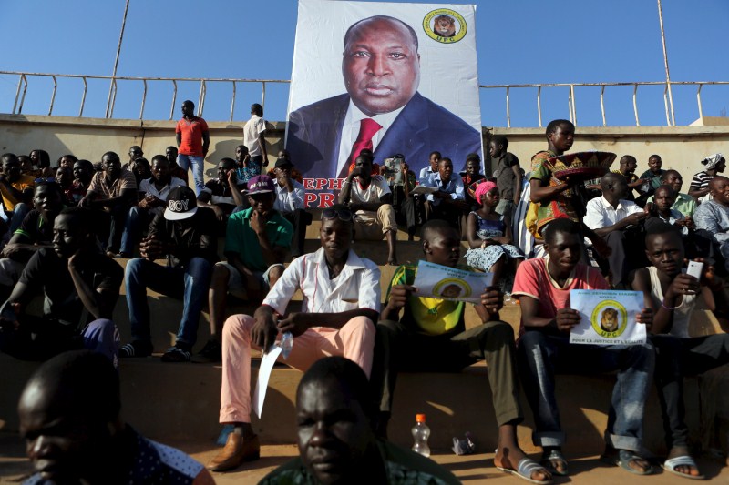 Burkina Faso votes in its first free election in three decades, a year after Blaise Compaore was ousted in a military-backed uprising. Burkina votes,Roch Marc Kabore,Zephirin Diabre,Burkina Faso votes