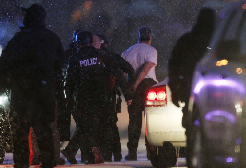 Images from the standoff at a Planned Parenthood clinic in Colorado Springs. Shootout at Planned Parenthood Center,Colorado Springs Shootout at Planned Parenthood Center,Parenthood Center,Colorado Springs,Springs Shootout,Planned Parenthood Center