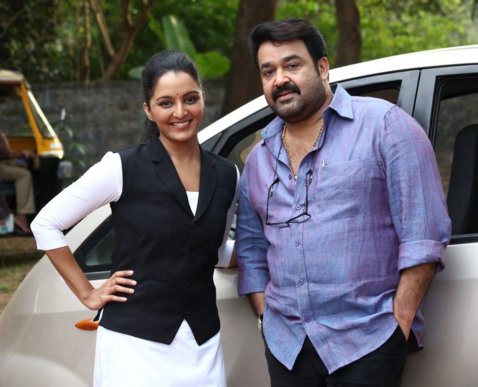 Mohanlal and Manju Warrier in 'Ennum Eppozhum' Mohanlal and Manju Warrier,Manju Warrier,Mohanlal,Ennum Eppozhum,Ennum Eppozhum stills,Ennum Eppozhum posters