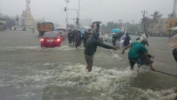 After some days of respite, fresh downpour on Tuesday crippled life here, flooding numerous roads and neighbourhoods and causing traffic jams and power cuts. Chennai Rainfall,Chennai battles Flooding after Heavy Rainfall,Chennai Flooding,Heavy Rainfall Chennai,ChennaiFloods,#ChennaiFloods,Chennai Floods