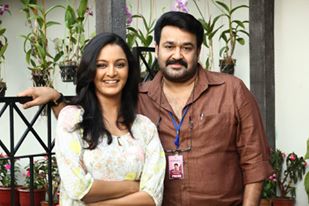 Mohanlal and Manju Warrier in 'Ennum Eppozhum' Mohanlal and Manju Warrier,Manju Warrier,Mohanlal,Ennum Eppozhum,Ennum Eppozhum stills,Ennum Eppozhum posters