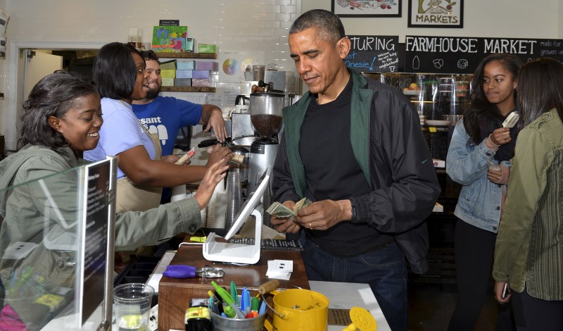 President Barack Obama took his teenage daughters Malia and Sasha shopping on Saturday for books and a sweet treat to promote Small Business Saturday, an annual event designed to boost holiday shopping at mom-and-pop shops. Barack Obama,Barack Obama shops at Washington bookstore,Barack Obama at Washington bookstore,Washington bookstore,Malia and Sasha,President Barack Obama