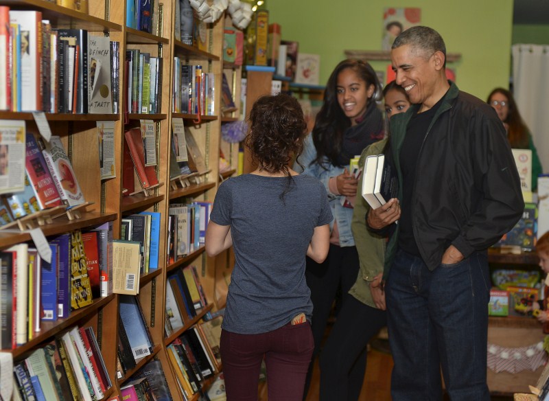 President Barack Obama took his teenage daughters Malia and Sasha shopping on Saturday for books and a sweet treat to promote Small Business Saturday, an annual event designed to boost holiday shopping at mom-and-pop shops. Barack Obama,Barack Obama shops at Washington bookstore,Barack Obama at Washington bookstore,Washington bookstore,Malia and Sasha,President Barack Obama