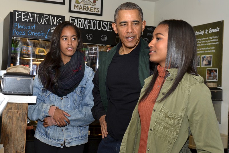 President Barack Obama took his teenage daughters Malia and Sasha shopping on Saturday for books and a sweet treat to promote Small Business Saturday, an annual event designed to boost holiday shopping at mom-and-pop shops. Barack Obama,Barack Obama shops at Washington bookstore,Barack Obama at Washington bookstore,Washington bookstore,Malia and Sasha,President Barack Obama