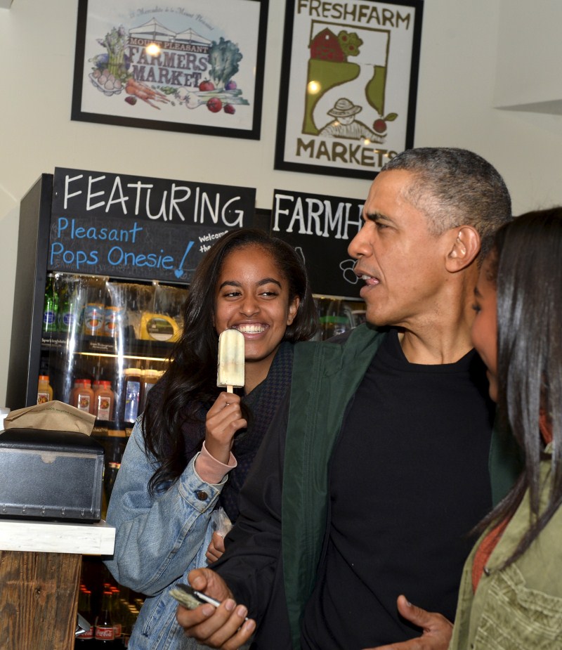 President Barack Obama took his teenage daughters Malia and Sasha shopping on Saturday for books and a sweet treat to promote Small Business Saturday, an annual event designed to boost holiday shopping at mom-and-pop shops. Barack Obama,Barack Obama shops at Washington bookstore,Barack Obama at Washington bookstore,Washington bookstore,Malia and Sasha,President Barack Obama