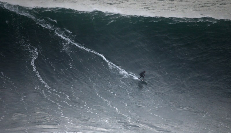 Portugal's Praia do Norte has become legendary for big wave surfing. Monster Waves at Nazare,Monster Waves at Nazare in Portugal,Monster Waves,wave surfing