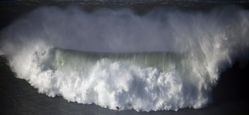Portugal's Praia do Norte has become legendary for big wave surfing. Monster Waves at Nazare,Monster Waves at Nazare in Portugal,Monster Waves,wave surfing