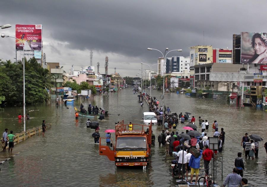 After some days of respite, fresh downpour on Tuesday crippled life here, flooding numerous roads and neighbourhoods and causing traffic jams and power cuts. Chennai Rainfall,Chennai battles Flooding after Heavy Rainfall,Chennai Flooding,Heavy Rainfall Chennai,ChennaiFloods,#ChennaiFloods,Chennai Floods